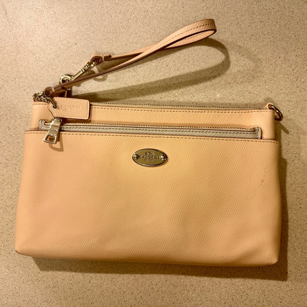 Good used condition Coach clutch purse ivory and peach